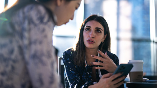 Image 3: Two people in conversation